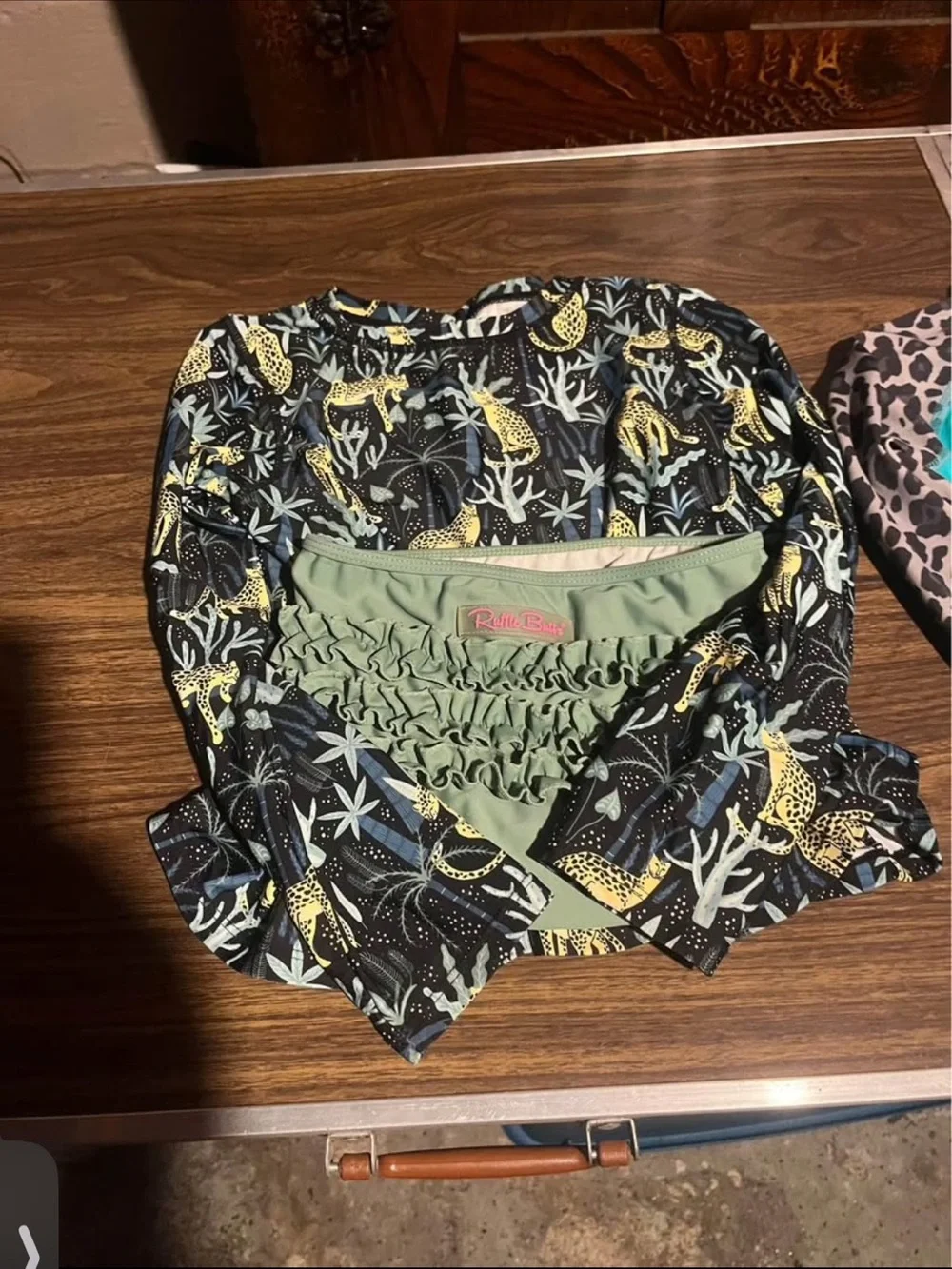 Ruffle Butts Black Top with Yellow Cheetah and Green Accents